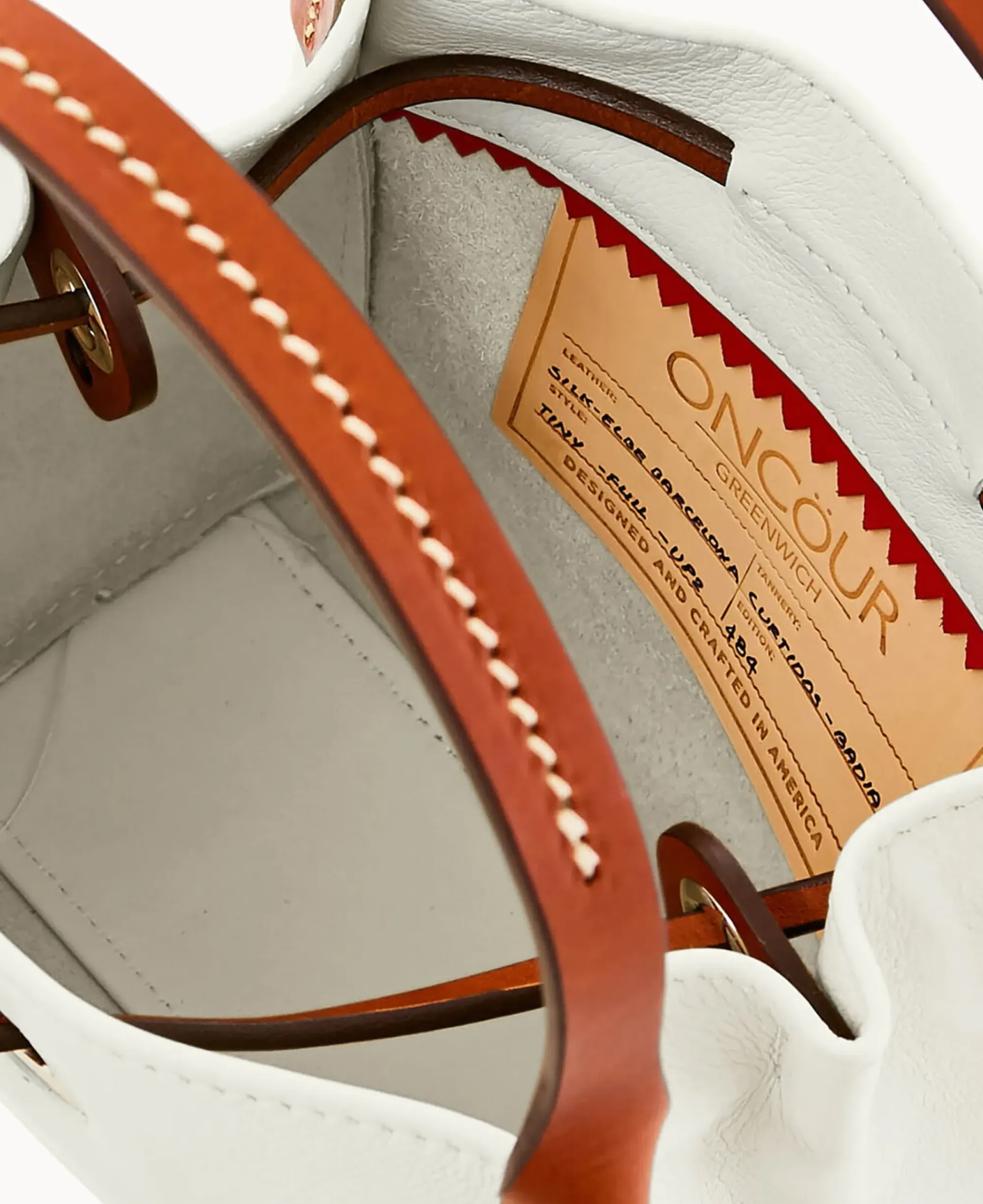 Dooney & Bourke Ready For the Getaway|Smooth Leather<Oncour Elba Tiny Full Up Pure White