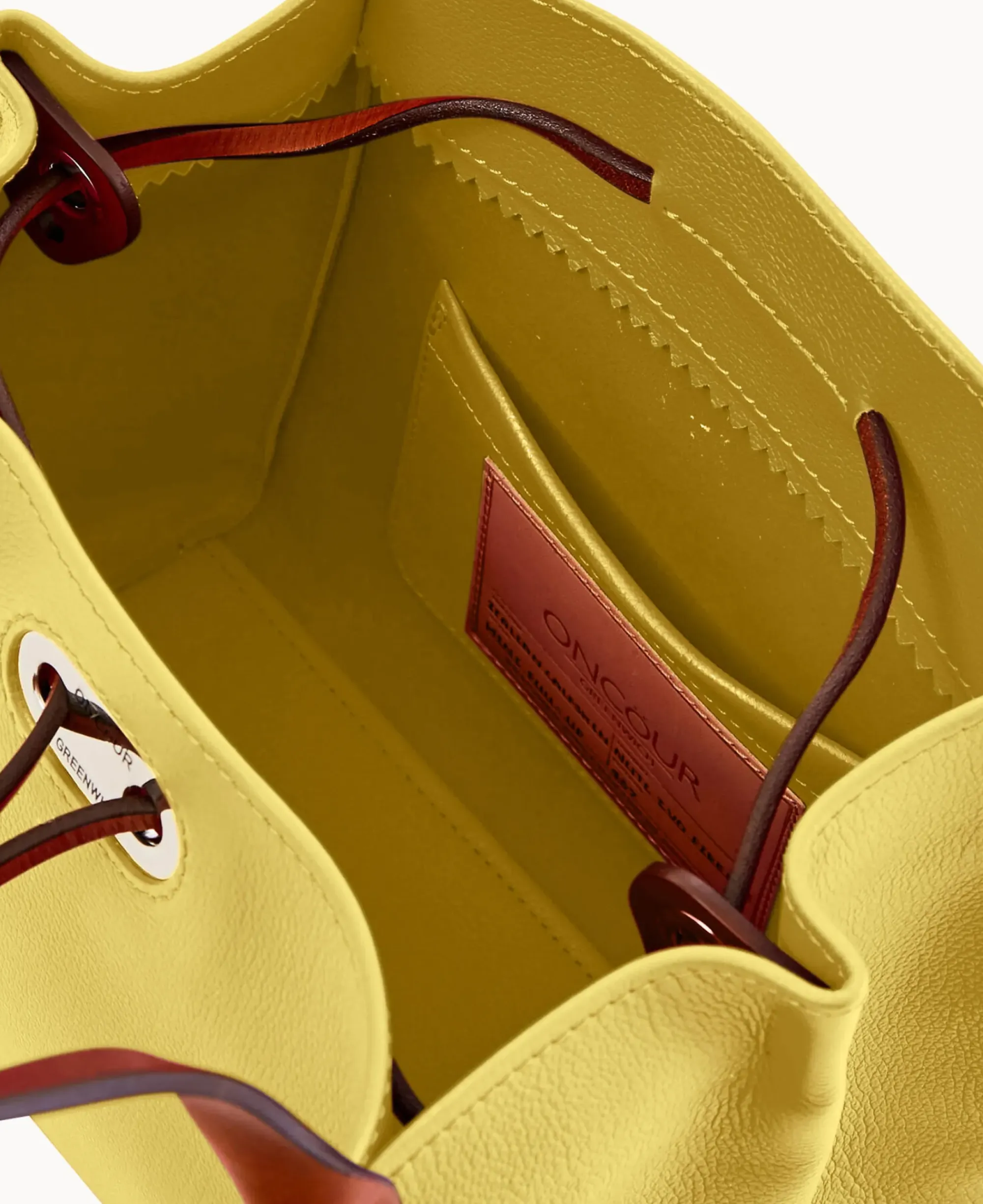 Dooney & Bourke Ready For the Getaway|Textured Leather<Oncour Twist Mini Full Up Butter